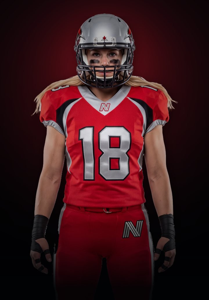 Dallas Apex athlete in a red and silver number 18 jersey